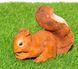 buy Garden figure Squirrel gnawing a nut 1